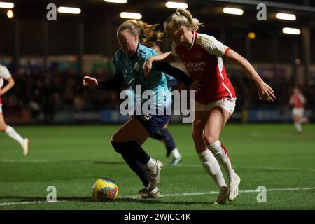 Dartford, UK. 14th Feb, 2024. Dartford, Kent, 14 February 2024: Stina Blackstenius (25 Arsenal) and Paige Culver (22 London City Lionesses) battle for possession during the Continental Tyres League Cup football match between London City Lionesses and Arsenal at Princes Park in Dartford, England. (James Whitehead/SPP) Credit: SPP Sport Press Photo. /Alamy Live News Stock Photo