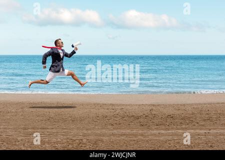 Happy businessman running on the beach with megaphone. Summer vacation concept. Stock Photo