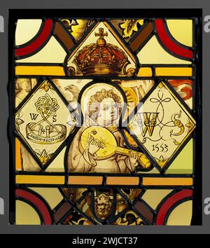 Ensemble with a Lute-Playing Angel; Unknown maker, English and Netherlandish; about 1450 and 1553; Colorless glass, vitreous paint, and silver stain; set within modern pieces of clear and colored glass; lead came. The panel contains a the angel musician, from the fifteenth century and the pair of quarries (small panes of uncolored glass, usually diamond shaped, with central motifs) from the sixteenth century. Each of the latter has the initials WS; one is inscribed CONFIDE RECTE AGENS (trust in doing right) and the other with the date 1553. These are set within fragments of southern Netherland Stock Photo