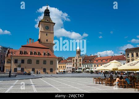 Old Town Hall, Church of the Assumption of the Virgin Mary and town houses on the market square Piata Sfatului, Old Town, Brasov, Brasov Stock Photo