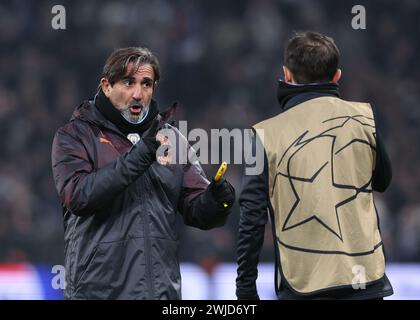 Copenhagen, Denmark. 13th Feb, 2024. Manchester City fitness coach Lorenzo Buenaventura talks with Bernardo Silva of Manchester City during the warm up before the UEFA Champions League match at Telia Parken, Copenhagen. Picture credit should read: Paul Terry/Sportimage Credit: Sportimage Ltd/Alamy Live News Stock Photo