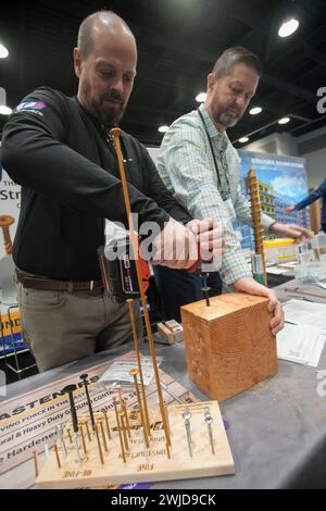 Vancouver, Canada. 14th Feb, 2024. An exhibitor showcases different industrial screws and fasteners during BUILDEX 2024 at the Vancouver Convention Center in Vancouver, British Columbia, Canada, on Feb. 14, 2024. About 340 exhibitors from around the world showcased their latest products and technologies at BUILDEX 2024, Western Canada's convention and trade show for the construction industry. Credit: Liang Sen/Xinhua/Alamy Live News Stock Photo