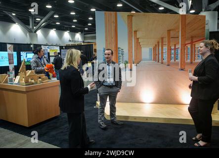 Vancouver, Canada. 14th Feb, 2024. People attend the BUILDEX 2024 at the Vancouver Convention Center in Vancouver, British Columbia, Canada, on Feb. 14, 2024. About 340 exhibitors from around the world showcased their latest products and technologies at BUILDEX 2024, Western Canada's convention and trade show for the construction industry. Credit: Liang Sen/Xinhua/Alamy Live News Stock Photo