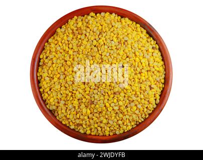 Split mung bean isolated on a clay bowl on a white background Stock Photo