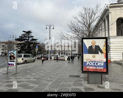 14 February 2024, Ukraine, Sewastopol: Ahead of the Russian presidential election on March 17, there are posters in many parts of the city promoting the re-election of Kremlin leader Putin. The poster in the city center of the port city reads 'The West doesn't need Russia. We need Russia'. Many Crimeans are grateful to Putin for seizing the peninsula from Ukraine by force ten years ago and integrating it into the giant empire. This year, Russia is celebrating the 10th anniversary of the annexation of Crimea, which is part of Ukraine under international law. Photo: Ulf Mauder/dpa Stock Photo