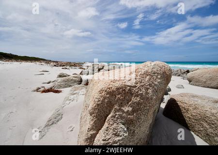 The beautiful beach with rocks on it with the sea in the background in Bay of Fire, Tasmania, Australia Stock Photo