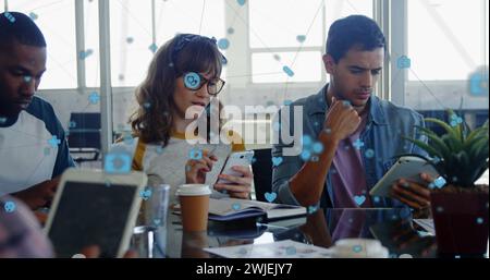 Digital interface image depicts global network technology among device-using colleagues. Stock Photo