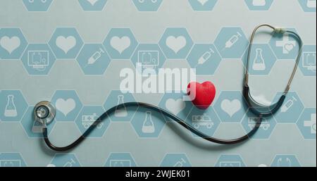 Image of medical icons over stethoscope with heart Stock Photo