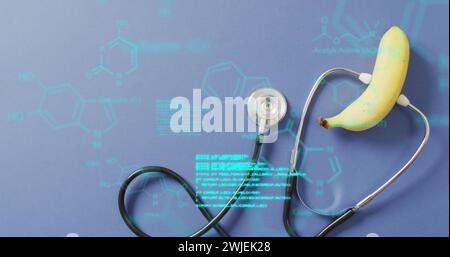 Image of data processing over stethoscope and banana Stock Photo
