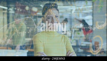Image of data processing over biracial businesswoman smiling Stock Photo