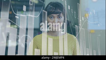 Image of data processing over biracial businesswoman smiling Stock Photo