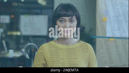 Image of data processing over biracial businesswoman smiling Stock Photo
