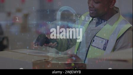 Image of cyber attack text and data processing over biracial man working in warehouse Stock Photo