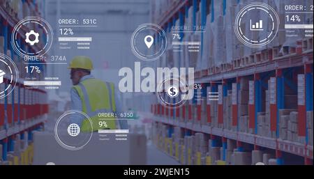 Image of icons with data processing over caucasian male worker in warehouse Stock Photo