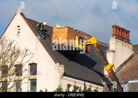 Demolition of Nazareth House in Southend, Essex, former convent nursing & residential home operated by the Sisters of Nazareth. Roof slate removal Stock Photo