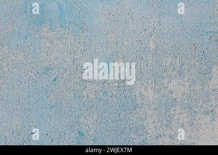 Soft blue abstract background with cracked paint. Stock Photo