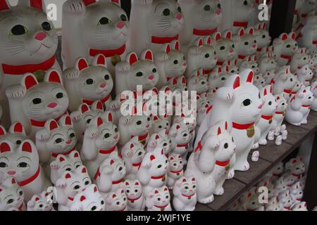 Manekineko Lucky Cats at Gotokuji Temple, Tokyo, Japan Stock Photo