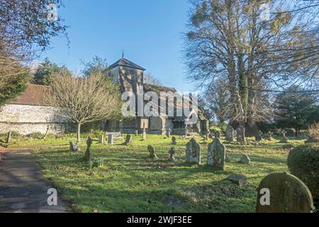 the tiny st catherine of siena church in cocking west sussex, parts of which date from the 11th century Stock Photo