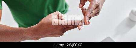 cropped african american man using sign language for nonverbal communication, deaf culture banner Stock Photo