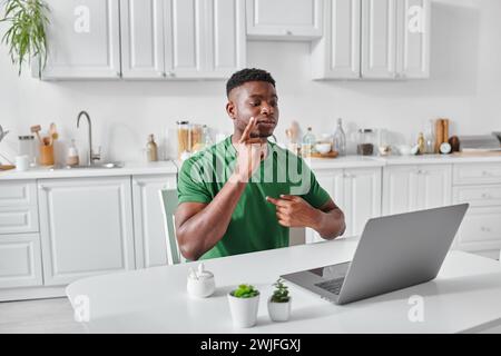 deaf african american freelancer using sign language for communication during video call Stock Photo