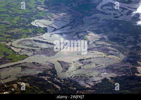 Davao City, Philippines. 14th Feb, 2024. Aerial view of flooded area in the province of Mindanao caused by massive rains trigging floods and landslides damaging homes and killing at least 22 people seen from a U.S Marine KC-130J Super Hercules aircraft, February 14. 2024 over Davao, Mindanao, Philippines. The U.S Marines are providing humanitarian assistance. Credit: Sgt. Savannah Mesimer/US Marine Corps/Alamy Live News Stock Photo