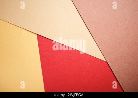 Background created with the foreground of stacked ochre cardstocks Stock Photo