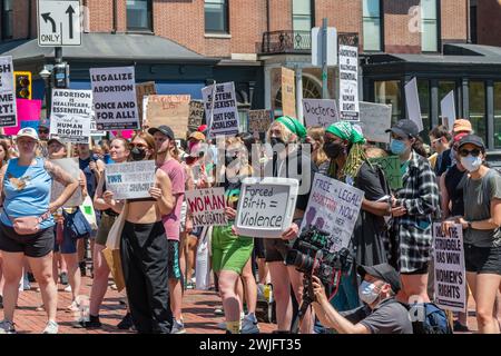 Boston, MA, US-June 25, 2022:  Protests holding pro-abortion signs at demonstration in response to the Supreme Court ruling overturning Roe v. Wade. Stock Photo