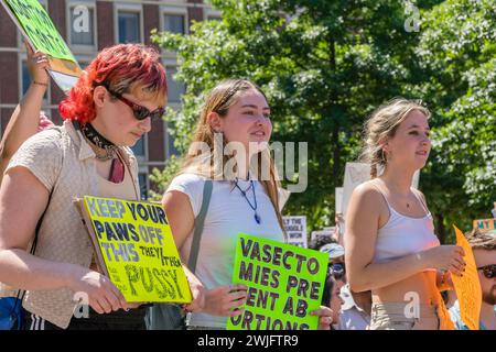 Boston, MA, US-June 25, 2022:  Protests holding pro-abortion signs at demonstration in response to the Supreme Court ruling overturning Roe v. Wade. Stock Photo