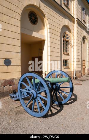 An old canon painted in blue near Drottningholm castle in Stockholm, Sweden, during a sunny day. Bright light. Stock Photo