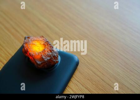 Semstone under the spotlight of a flashlight Stock Photo