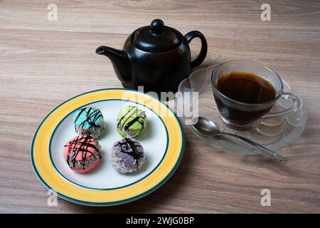 alfajores, cornstarch pastries with caramel sauce and coconut, tea time Stock Photo