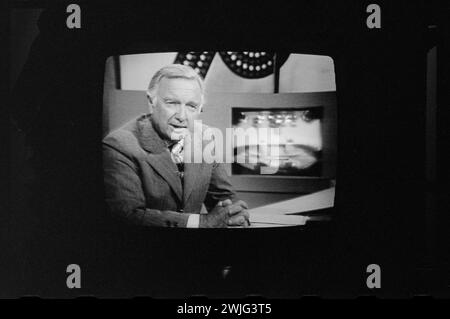 Walter Cronkite on television during the first presidential debate between Ford and Carter, Philadelphia, Pennsylvania, 9/23/1976. (Photo by Thomas O'Halloran/US News and World Report Magazine Collection) Stock Photo