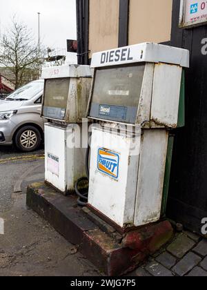 Ramsbottom Bury 10 February 2024. Pair of old well used roadside vehicle vehicle fuel pumps for diesel and petrol, thrust brand Stock Photo