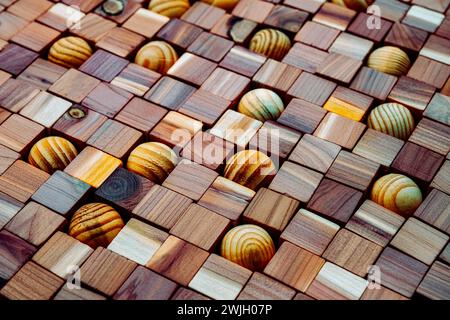 natural wooden mosaics cubes and  balls, random wooden floor tiles, wood artwork, wooden background Stock Photo