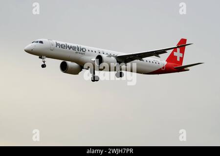 RECORD DATE NOT STATED Airplane landing in Kloten: Helvetic s Embraer E195-E2. HB-AZL - An Embraer E195-E2 of Swiss airline Helvetic Airways approaches Kloten Airport in its blue and white livery. The plane, with its sleek, modern lines, is an example of state-of-the-art aviation technology. The Embraer E195-E2 can accommodate up to 134 passengers and offers a high level of comfort and performance. Trivia: The Embraer E195-E2 is one of the most efficient regional jets in the world, with low fuel consumption and a minimal noise footprint. Copyright: xSergioxBrunettix Stock Photo