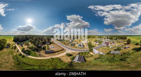 360 degree panoramic view of aerial hdri 360 panorama view over viilage from great height in equirectangular seamless spherical projection. may use like sky replacement for drone