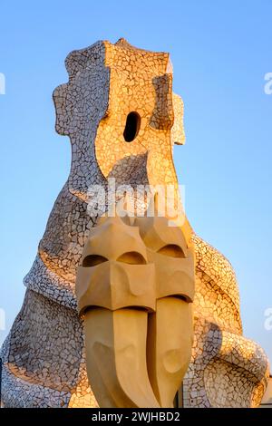 Trencadis mosaic, Casa Milà, La Pedrera, details of rooftop chimneys and vents at sunset, modernista architecture by Antoni Gaudí, Barcelona, Spain Stock Photo