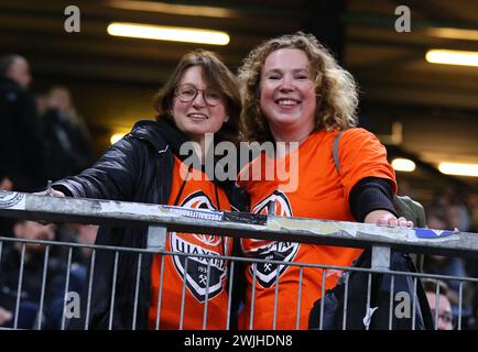 Hamburg, Germany - February 15, 2024: Shakhtar Donetsk supporters pose for a photo during the UEFA Europa League game against Marseille at Volksparkstadion in Hamburg, Germany Stock Photo