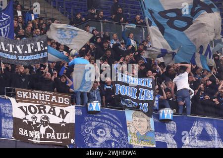 Hamburg, Germany - February 15, 2024: Marseille supporters show their support during the UEFA Europa League game against Shakhtar Donetsk at Volksparkstadion in Hamburg, Germany Stock Photo