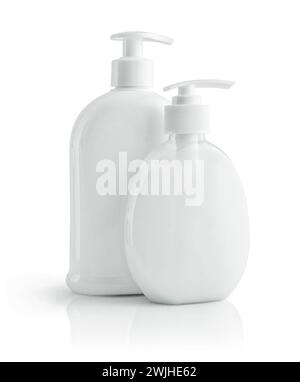 White unbranded dispenser bottles isolated on white background, cosmetic packaging mockup with copy space Stock Photo
