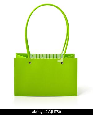 Green paper bag isolated on white background with reflection Stock Photo