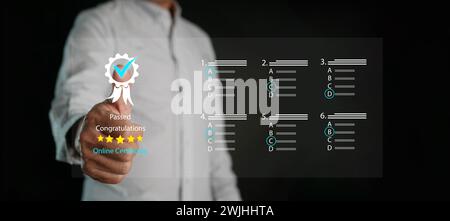 Online certification evaluation concept. A man takes assessment for digital certificate, questionnaire, survey, or examination. Multiple choices filli Stock Photo