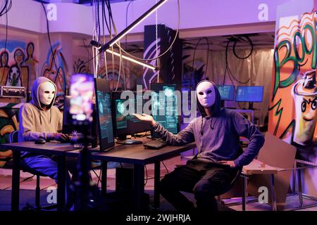 Anonymous criminal recording malicious activity on smartphone screen ...