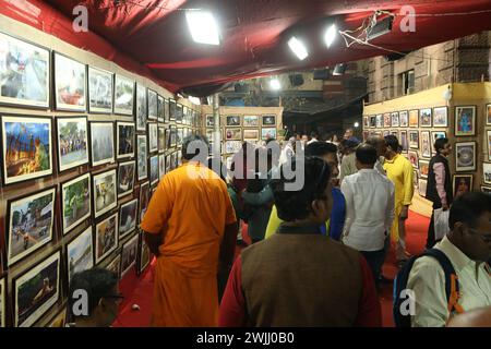 Kolkata, West Bengal, India. 14th Feb, 2024. Visitors attend the opening ceremony of the Kolkata Press Photographers' Association first time open air street side footpath two day's Photo Exhibition, 120 Photojournalist participate and 240 photographs display in Kolkata. (Credit Image: © Dipa Chakraborty/Pacific Press via ZUMA Press Wire) EDITORIAL USAGE ONLY! Not for Commercial USAGE! Stock Photo
