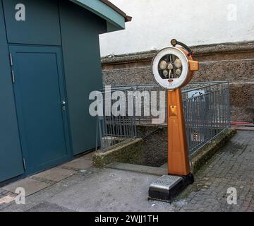 Austria, Salzburg - 01.13.2024: Retro scales in the old part of the city of Salzburg Stock Photo