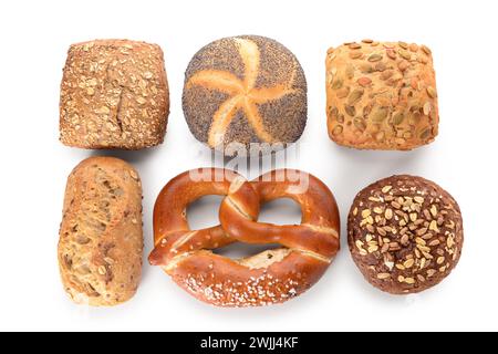 Different delicious buns and pretzel on white background Stock Photo