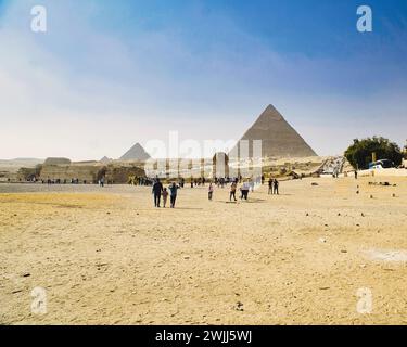 Cairo,Egypt: 19 November,2022- A panoramic view of Great Pyramids and Sphinx in Giza, Cairo, Egypt packed with tourists Stock Photo