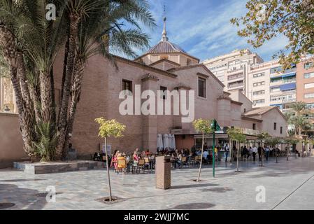 Urban view of the Gran Vía Alfonso x el Sabio with the facade of the Santa Clara convent museum in the old town of the Spanish city of Murcia, Spain, Stock Photo