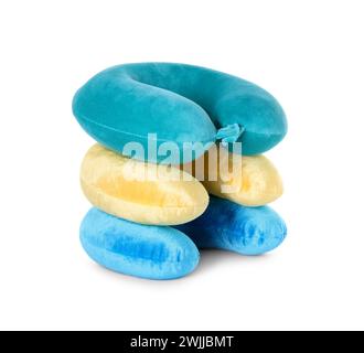 Stack of soft travel pillows isolated on white Stock Photo