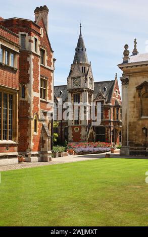 The view from the old court of old Pembroke college library with a Victorian neo-gothic clock tower . Cambridge university. United Kingdom Stock Photo